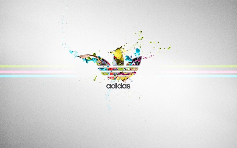 Adidas logo with paint splatter