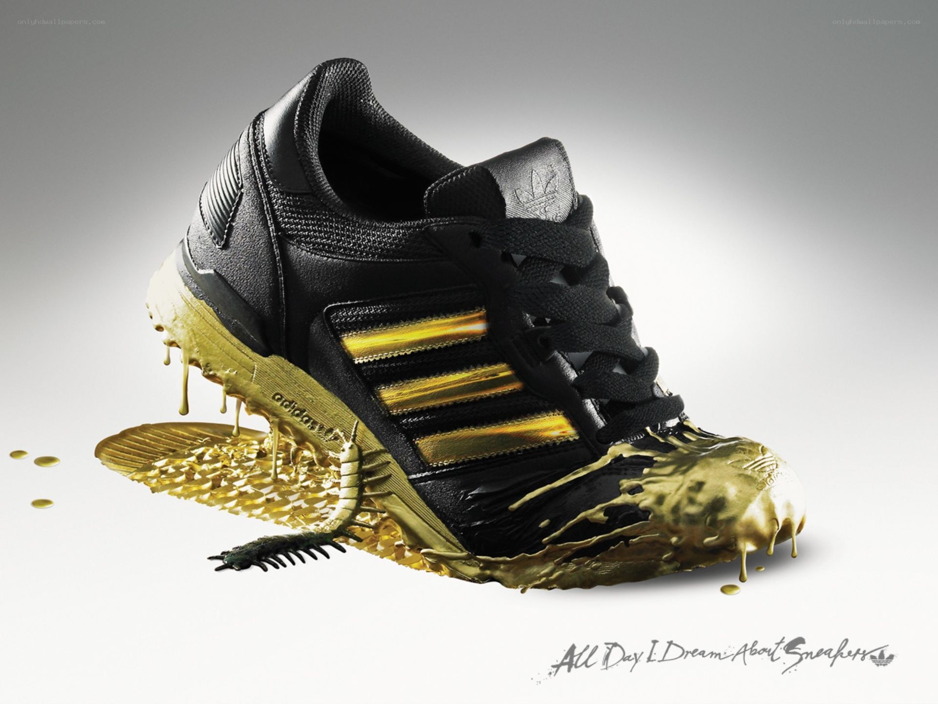 Adidas sneaker with gold paint