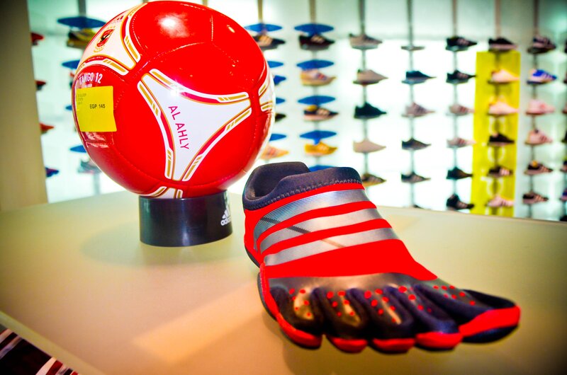 Adidas soccer ball and footwear