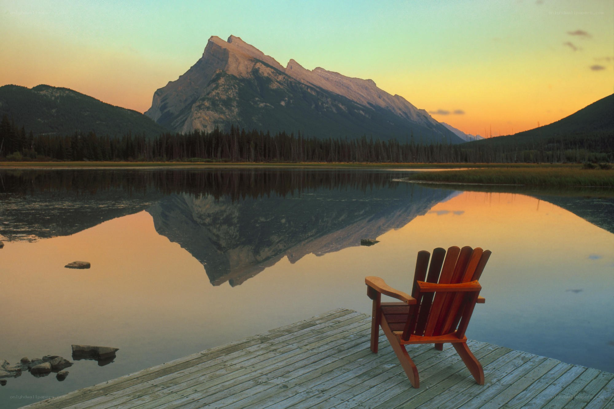 Adirondack chair at sunset