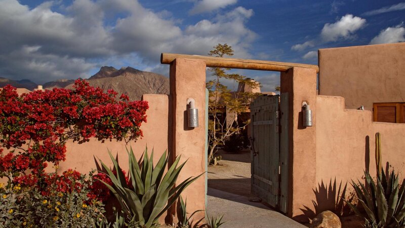 Adobe Gate with Flowers