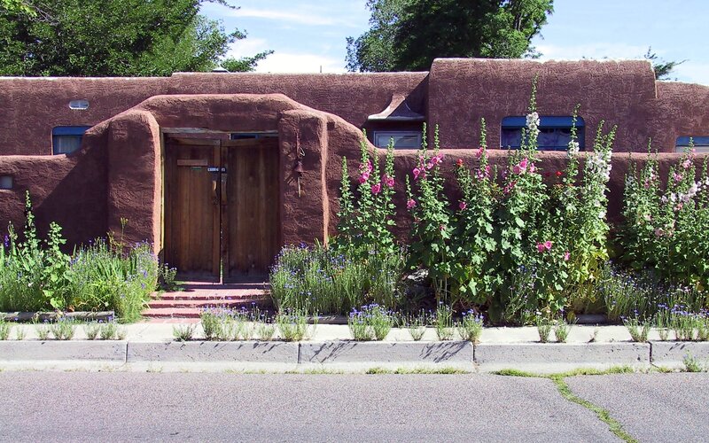 adobe house with flowers