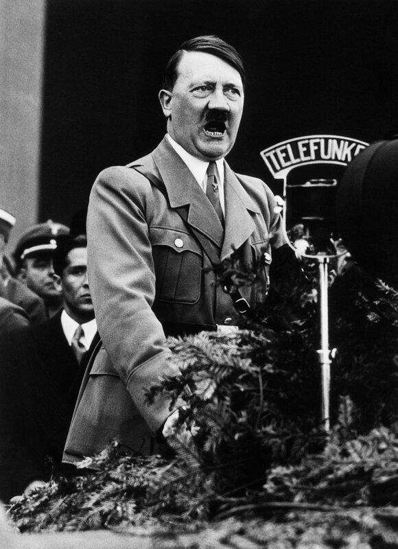 Adolf Hitler speaking at a rally