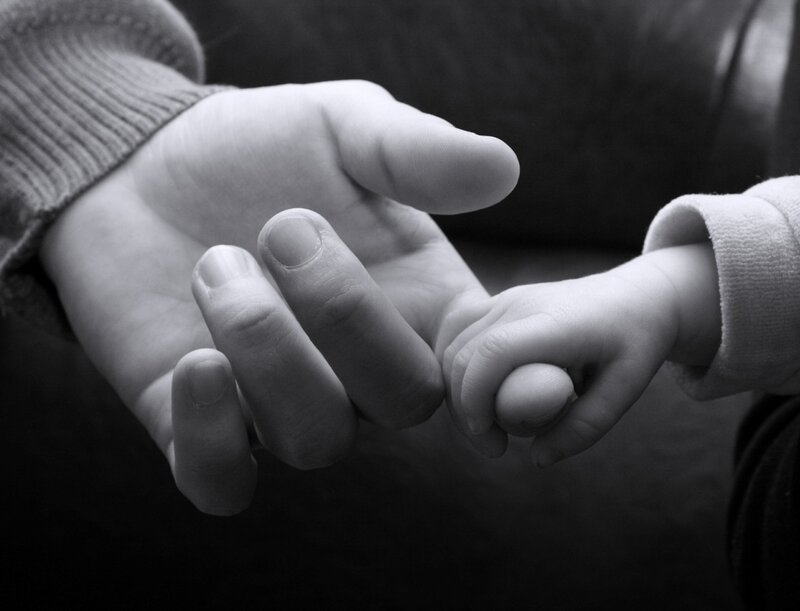 Adult and Child Hands