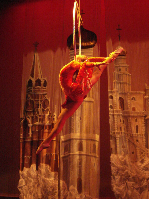 Aerial acrobat in red costume