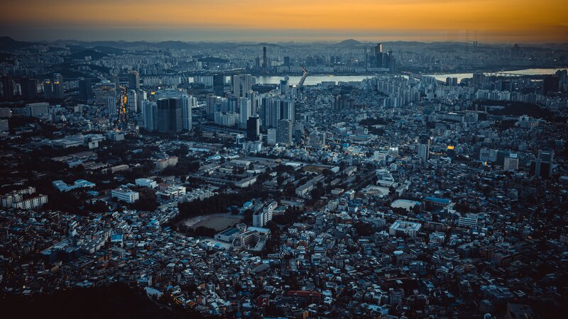 Aerial Cityscape at Dusk — Orange, Dramatic, Sunset, Photograph, Skyscrapers, River