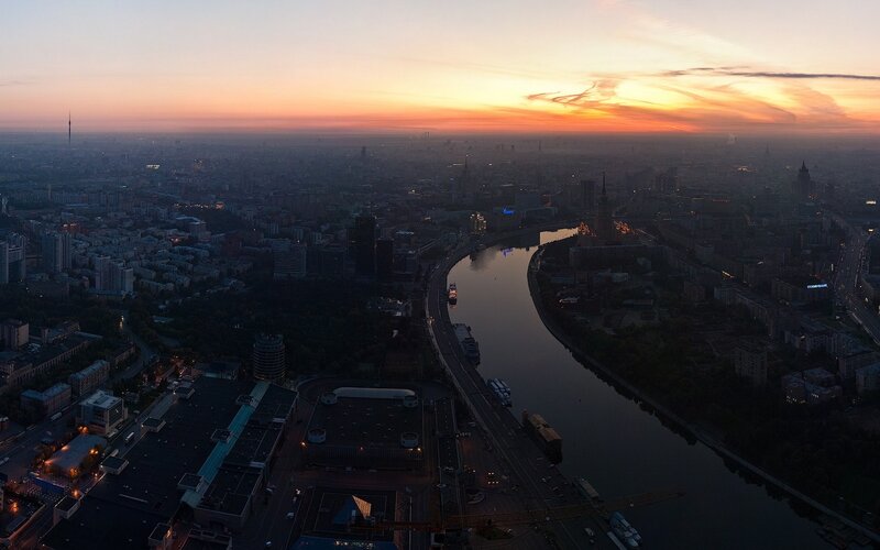 Aerial Cityscape at Dusk — Orange, Serene, Sunset, Photograph, River