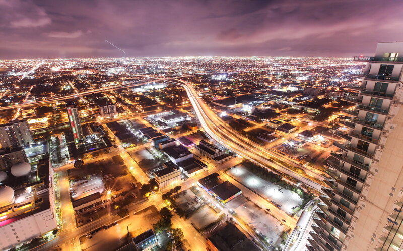 Aerial Cityscape at Night — Purple