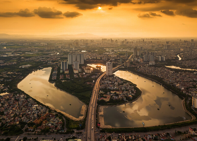 Aerial Cityscape at Sunset — Orange, Dramatic, Photograph, River
