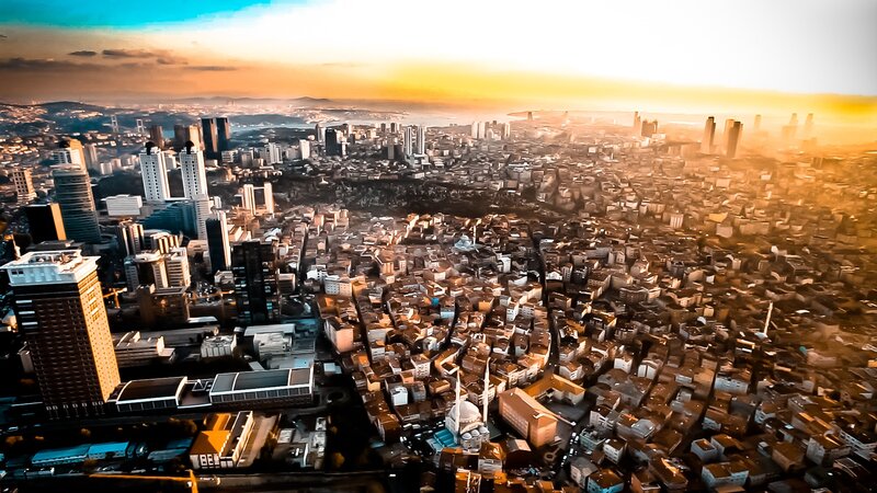 Aerial Cityscape at Sunset — Orange, Dramatic
