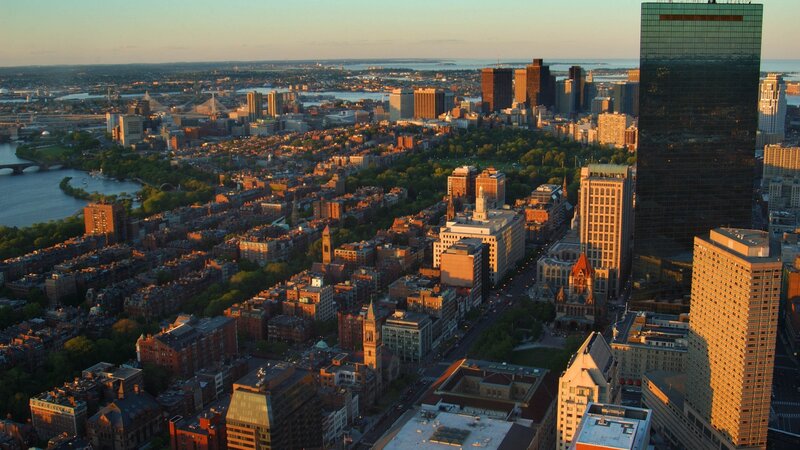 Aerial Cityscape at Sunset — Orange, Serene