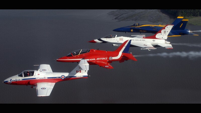 Aerial display of four jet teams