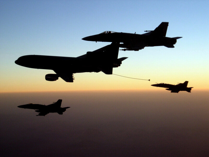 Aerial refueling at sunset