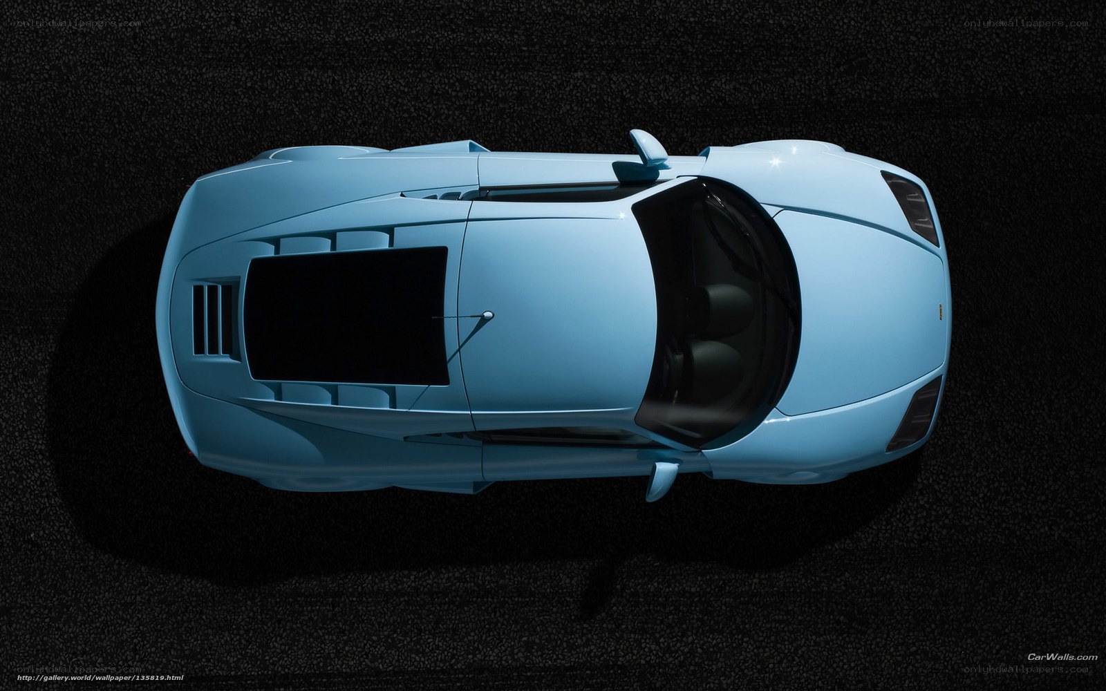 aerial view of a blue sports car