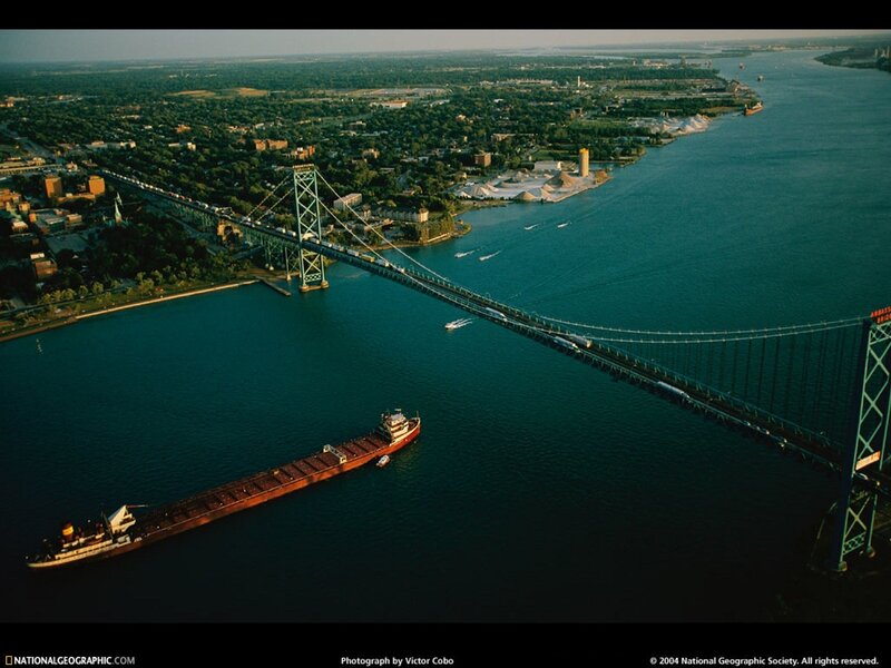 Aerial view of a bridge and ship