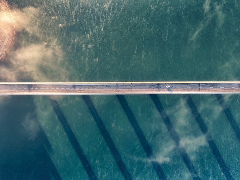 Aerial View of a Bridge — Blue, Serene, Afternoon, Photograph, Car