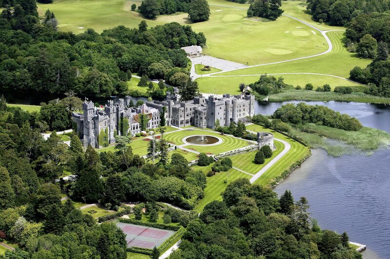 aerial view of a castle by the lake