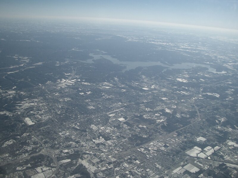 Aerial view of a city and lake