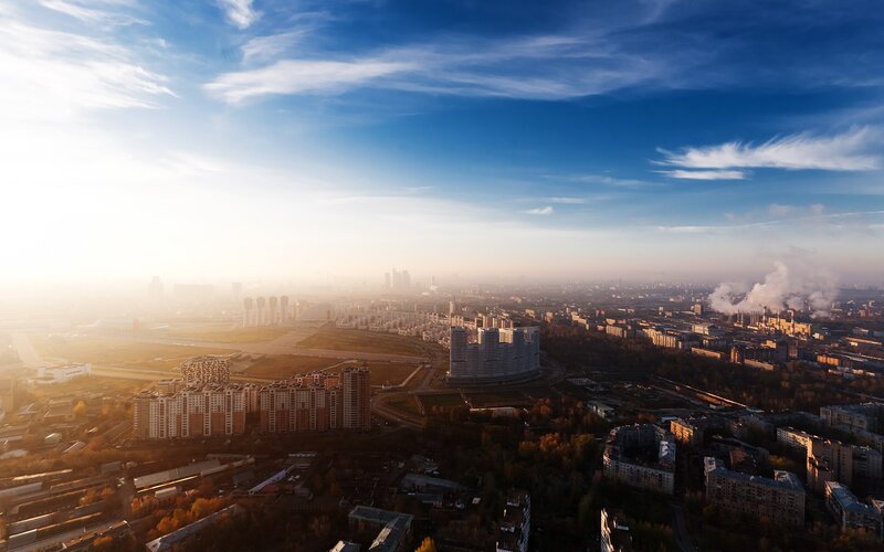 Aerial view of a city at sunrise