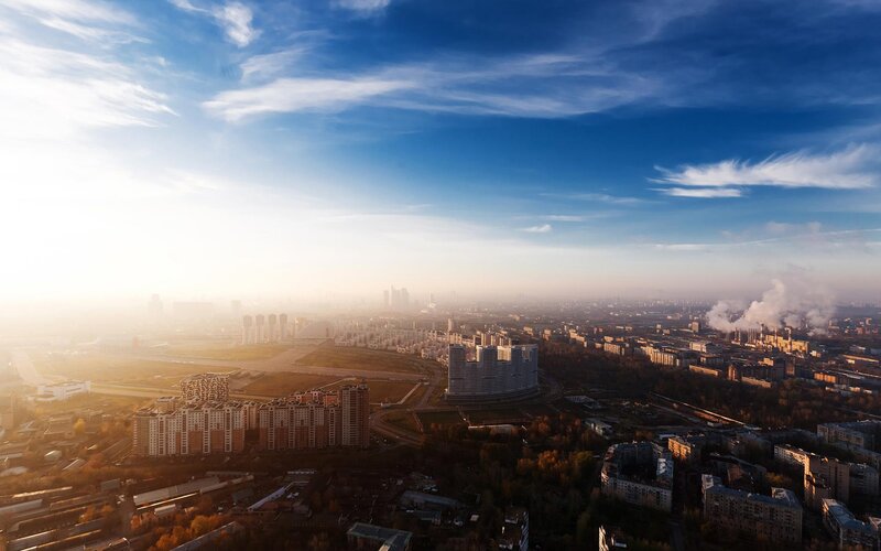 Aerial view of a city at sunrise