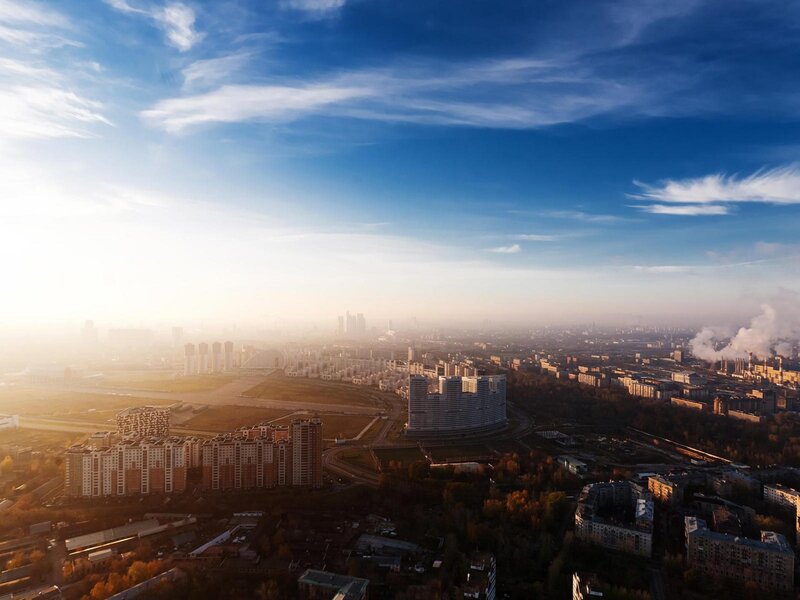 Aerial view of a city at sunrise