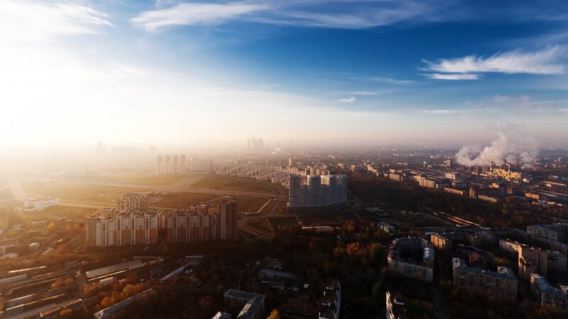 Aerial view of a city at sunrise