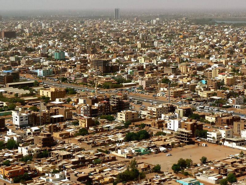 Aerial View of a City — Brown
