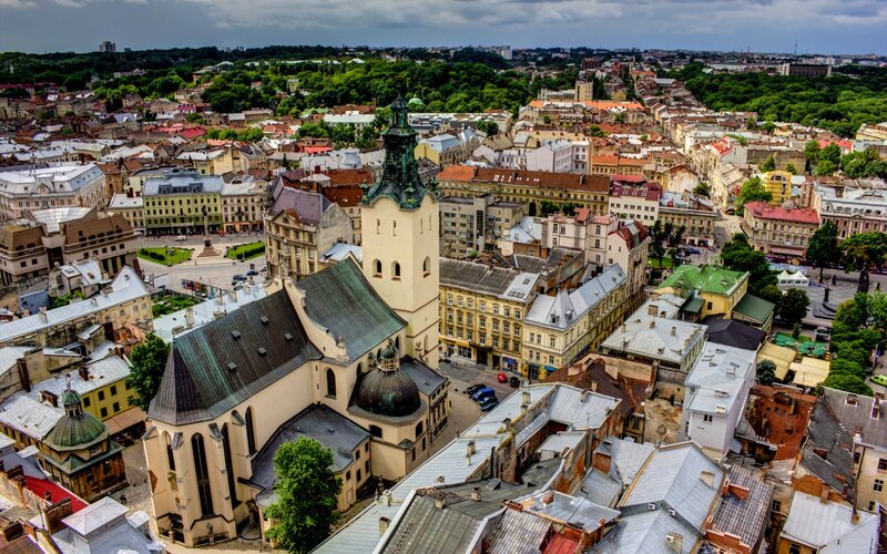 Aerial View of a City — Green, Dramatic
