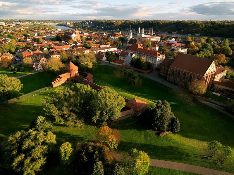 Aerial View of a City — Green, Serene, Sunset