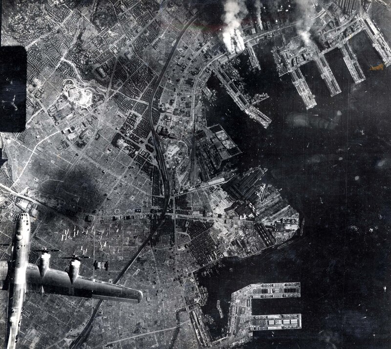 Aerial view of a city under attack