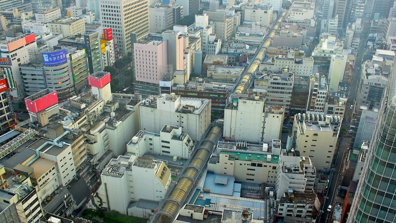 Aerial view of a city with elevated train tracks