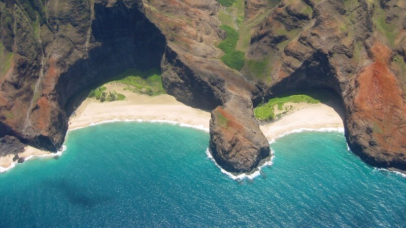 Aerial view of a coastal arch