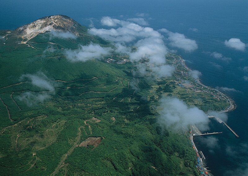 Aerial view of a coastal mountain