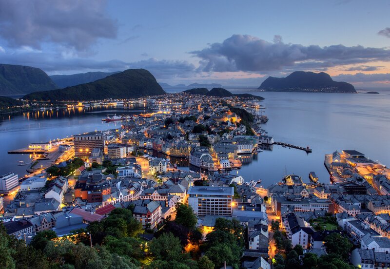 Aerial view of a coastal town at dusk