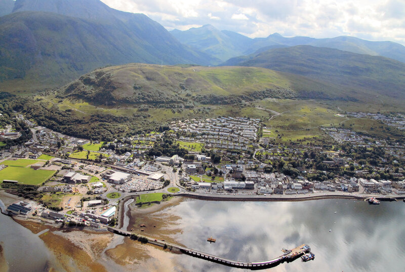 Aerial View of a Coastal Town — Green, Serene