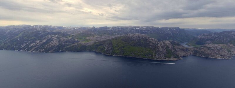 Aerial view of a fjord and mountains