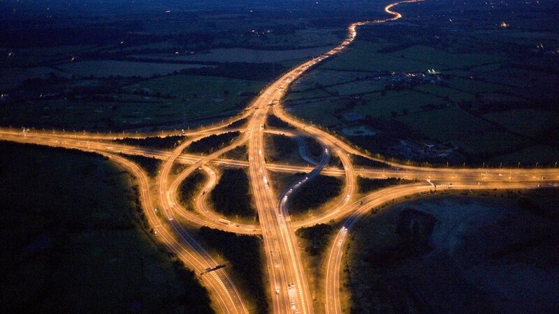 Aerial view of a highway interchange at night