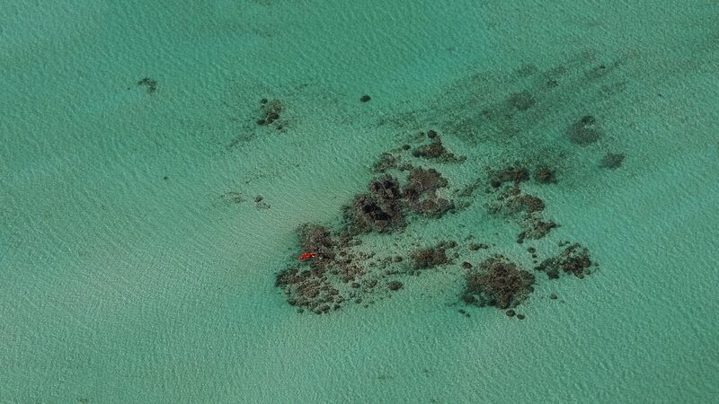 Aerial view of a kayak near rocks