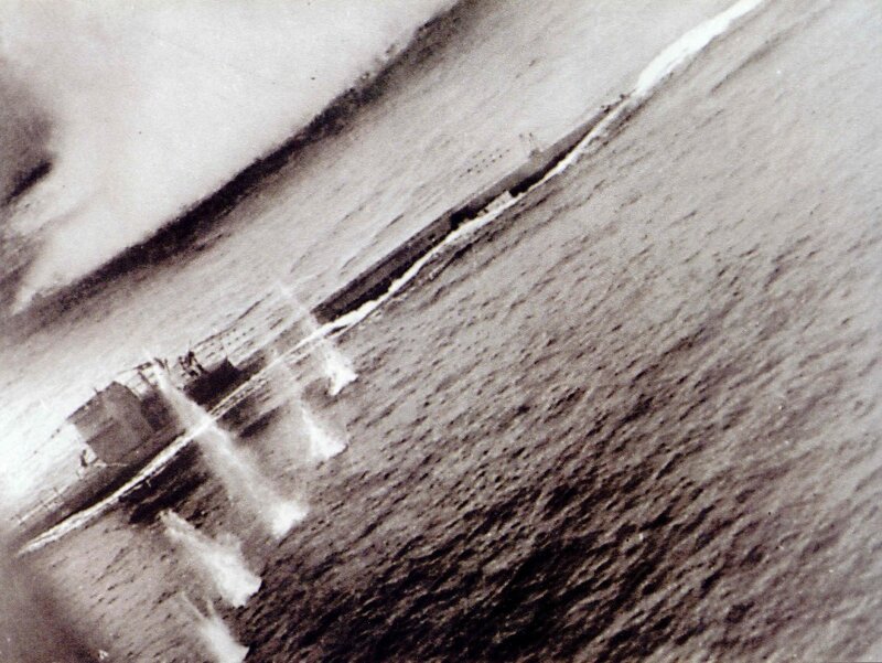 Aerial view of a ship sinking