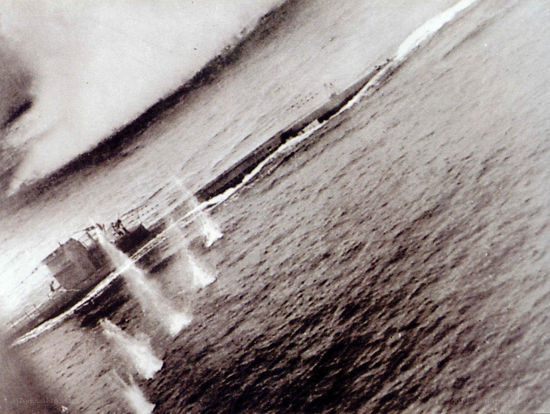 Aerial view of a ship sinking