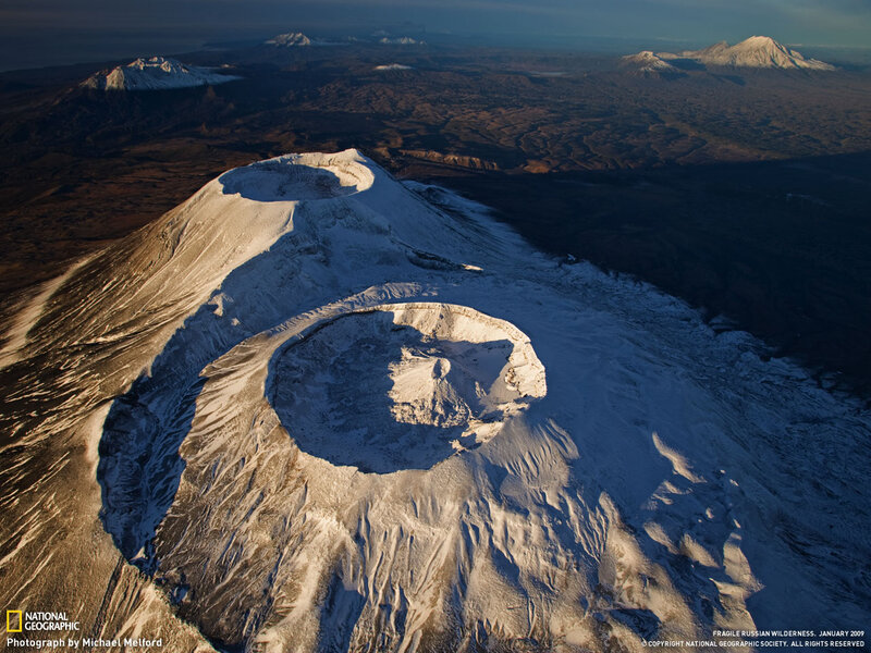 Aerial view of a snow-covered volcano