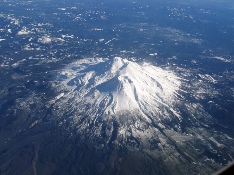 Aerial view of a snow-covered volcano