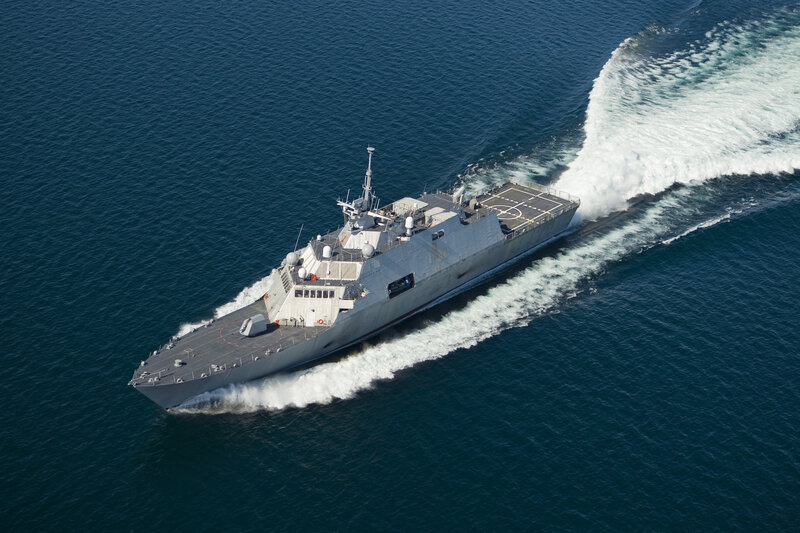 Aerial view of a warship at sea