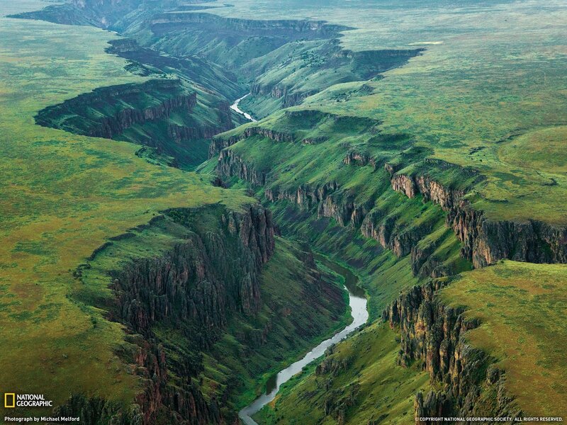 Aerial view of a winding river canyon