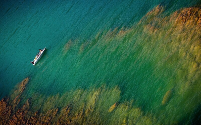 Aerial view of boat on turquoise water