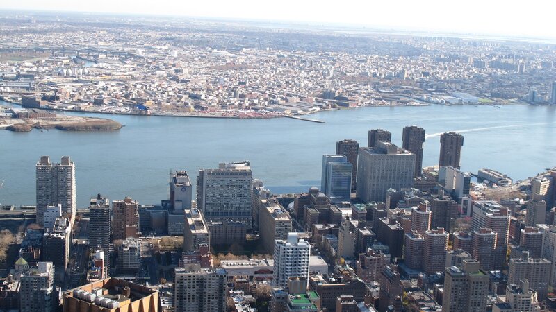 Aerial View of City — Blue, Serene, Afternoon, Photograph, Buildings, River
