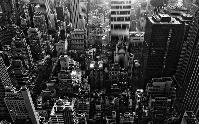 Aerial View of City Buildings — Black, Dramatic, Day