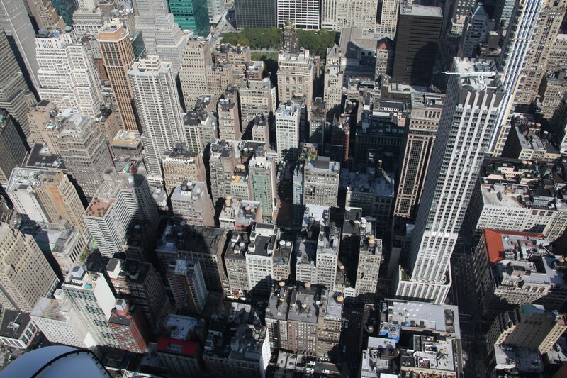Aerial View of City Buildings — Gray, Urban, Afternoon, Photograph, Skyscrapers, Rooftops, Streets