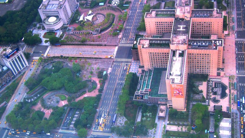 Aerial View of City Buildings — Green
