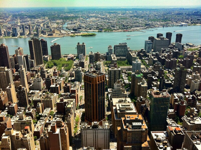 Aerial View of City — Gray, Urban, Afternoon, Photograph, Skyscrapers, River, Boats